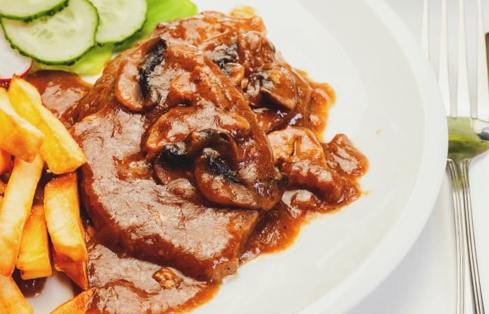 easy recipe for slow cooker pork chops with mushrooms feature