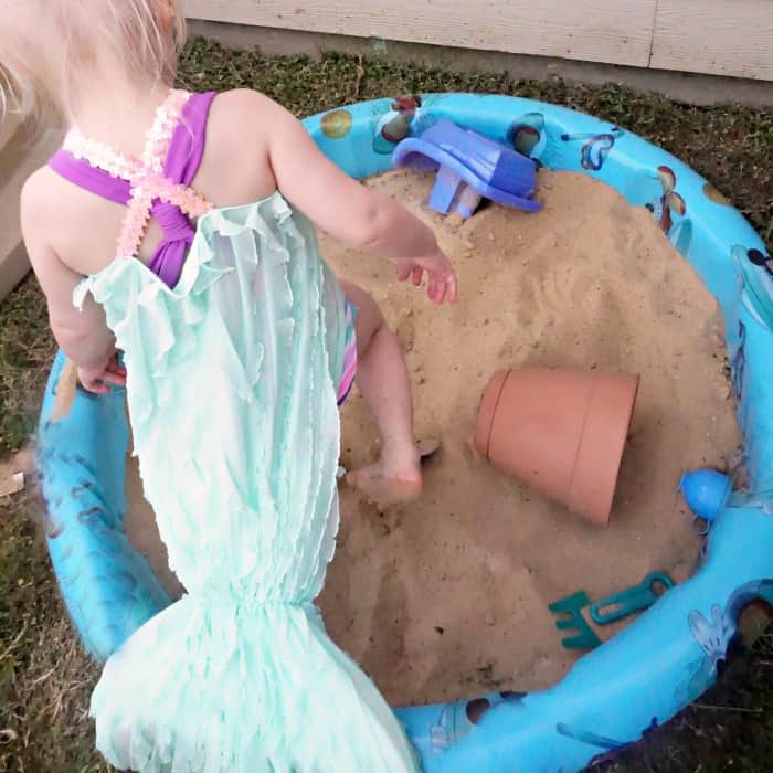 Cool tutorial for How to Make an Easy Mermaid Tail for a Toddler or Baby. It's like a tail for tiny people--which makes them think they're mermaids and is SO FREAKING adorable. It's ridiculous and fun. Try it. #nerdymammablog #mermaid #diy #tutorial #mermaidtail #kid #kiddressup