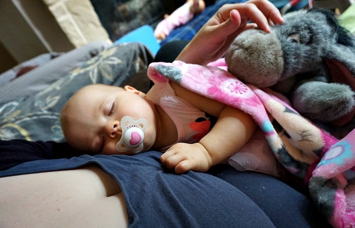 why should you hold your baby when they are napping feature