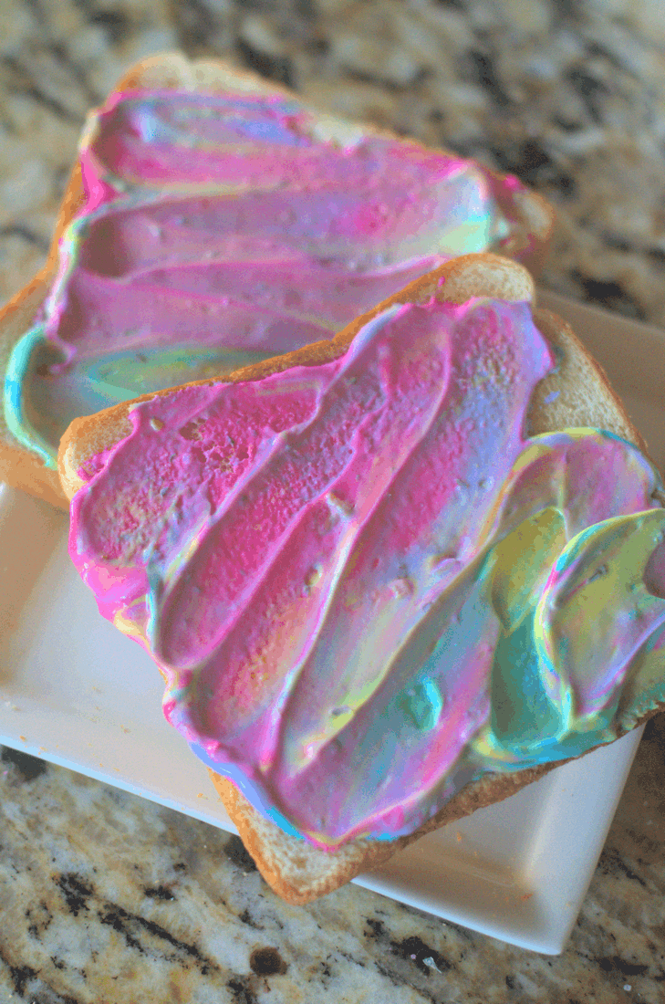 A ridiculous way to play with your kids' food and have fun with them. Because, frankly, having fun is one of the best things you can do with a kid. Breakfast Unicorn Toast. Freaking genius way to start a kid's day every once in a while. #nerdymammablog #unicorn #unicornfood #breakfast #unicornbreakfast #sillyfood #funwithfood #funfood #toast #creamcheese