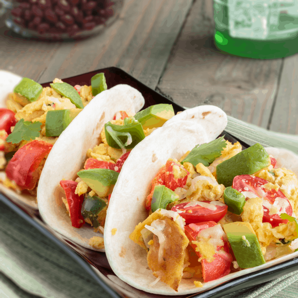 Holy Moley! These Authentic Mexican Breakfast Tacos are insanely yummy! #recipe #tasty #food #breakfast #breakfastrecipe #taco #tacos #tacorecipe #breakfasttacorecipe #authenticmexicanfood #authenticmexicanbreakfast #migas #migastaco
