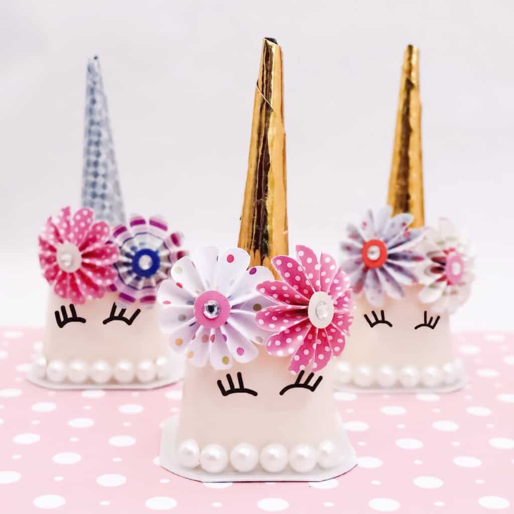Cheap supplies? Check. Tasty results? Check. A unicorn your kid can call their own? Priceless. Ok. Really, it's like $5. But still, that smile. These Unicorn Pudding Cups are astoundingly simple, fun to put together and cheap. What's not to love?! #nerdymammablog #unicorn #craft #unicorncraft #simplecraft #lunchbox #lunchboxcraft #puddingcup #pudding