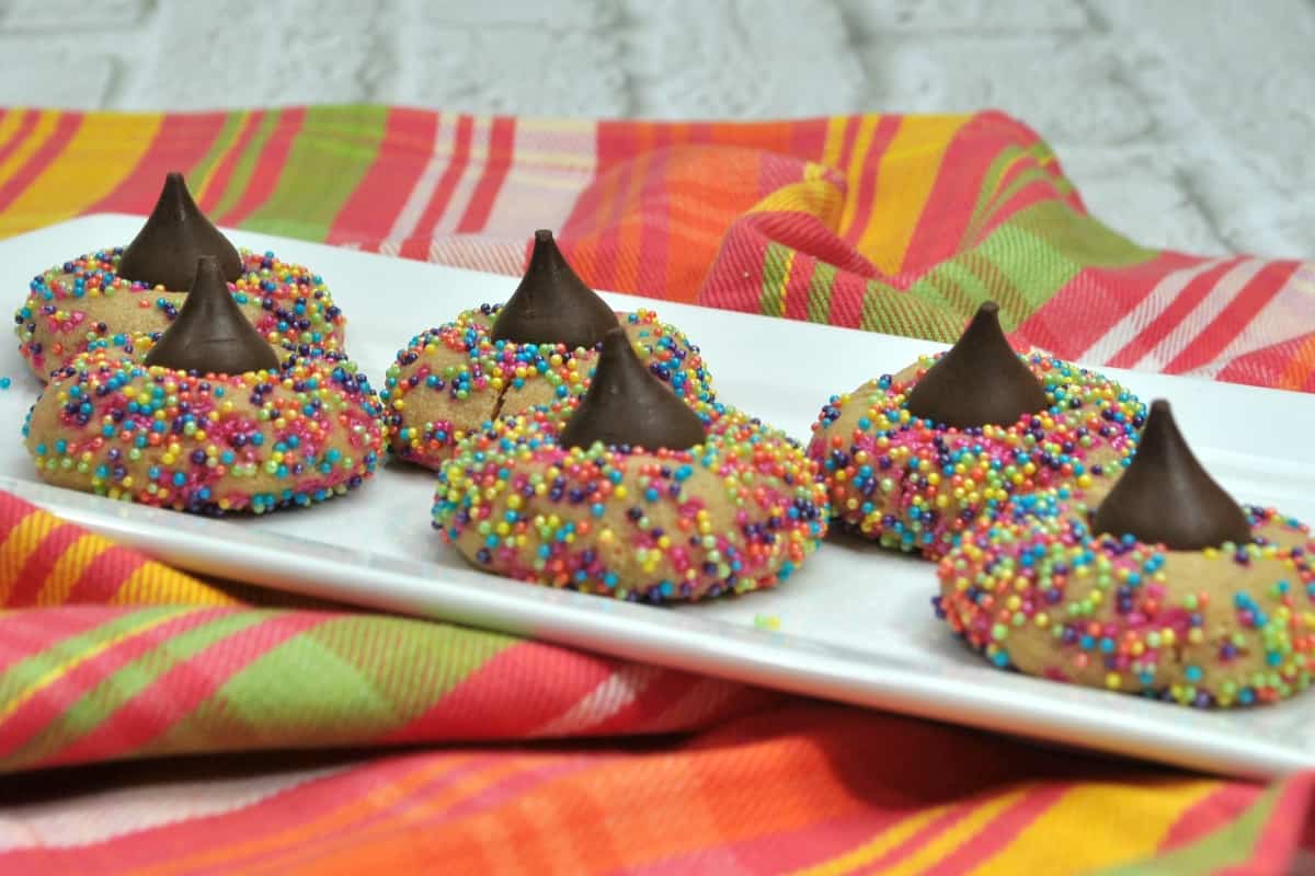 In a world where unicorns and their poop are so cute, I bring you, the best bringing-together of rainbow-goodness and poop: Unicorn Poop Cookies.) Simple, fun and oh, so tasty, these are a super-fun snack for any kid. #nerdymammablog #unicorn #unicornpoop #unicornrecipe #unicornpooprecipe
