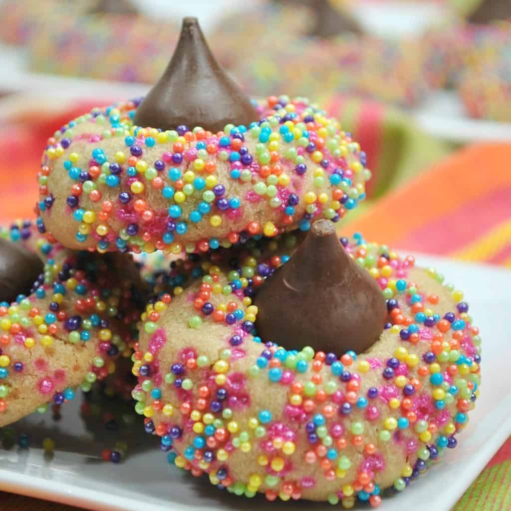 In a world where unicorns and their poop are so cute, I bring you, the best bringing-together of rainbow-goodness and poop: Unicorn Poop Cookies.) Simple, fun and oh, so tasty, these are a super-fun snack for any kid. #nerdymammablog #unicorn #unicornpoop #unicornrecipe #unicornpooprecipe