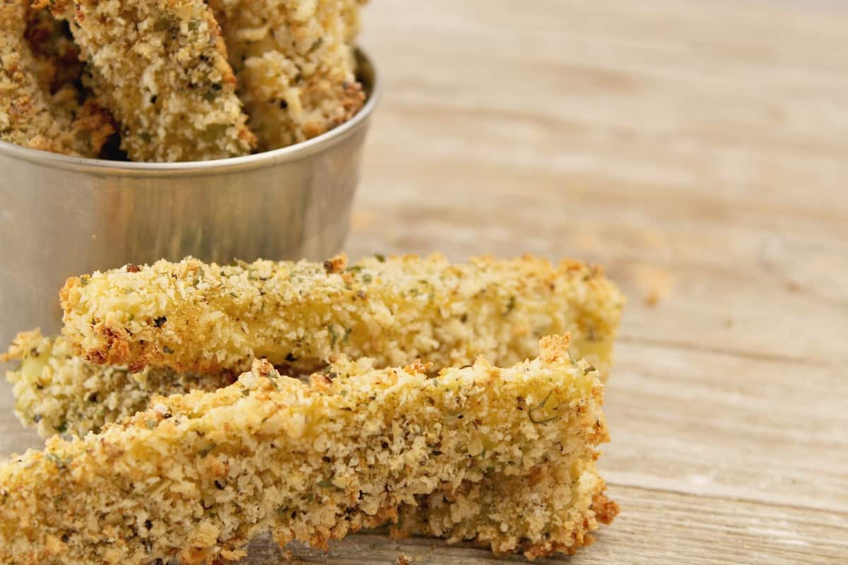 I love fried zucchini. But it's not always the simplest or healthiest. But these Zucchini Fries?! Freaking tasty and wonderful and so much healthier. I can't wait to make them again. #nerdymammablog #zucchini #fries #frenchfries 