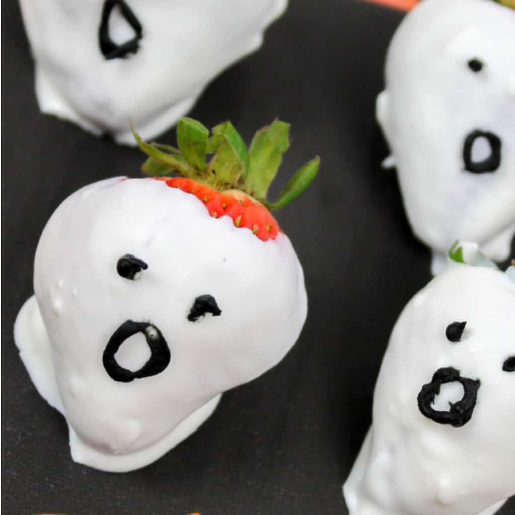 So, you're facing a school Halloween party? Yeah, me too. But we're ready, because we're making some easy Ghost Strawberries for our school Halloween party. Yep. I'm making 50 of these--but they're so simple, it's no big deal at all. #nerdymammablog #ghost #strawberry #halloween #party