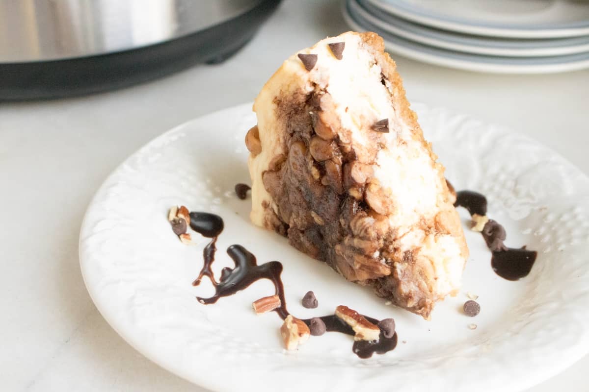 Let me start by saying this recipe for Instant Pot Reese's Chocolate Peanut Butter Cheesecake is so insanely good, I am drooling remembering it's magnificence. I warn you now, you will become addicted. #nerdymammablog #instantpot #cheesecake