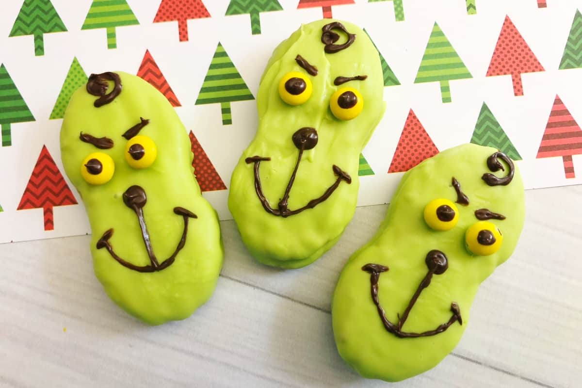 If I could make 10 snacks for my kids' holiday parties at school, the top of the list would be these simple Grinch Nutter Butters. Fast, easy, and so tasty I have to say, I may have eaten more than my share. #nerdymammablog #grinch