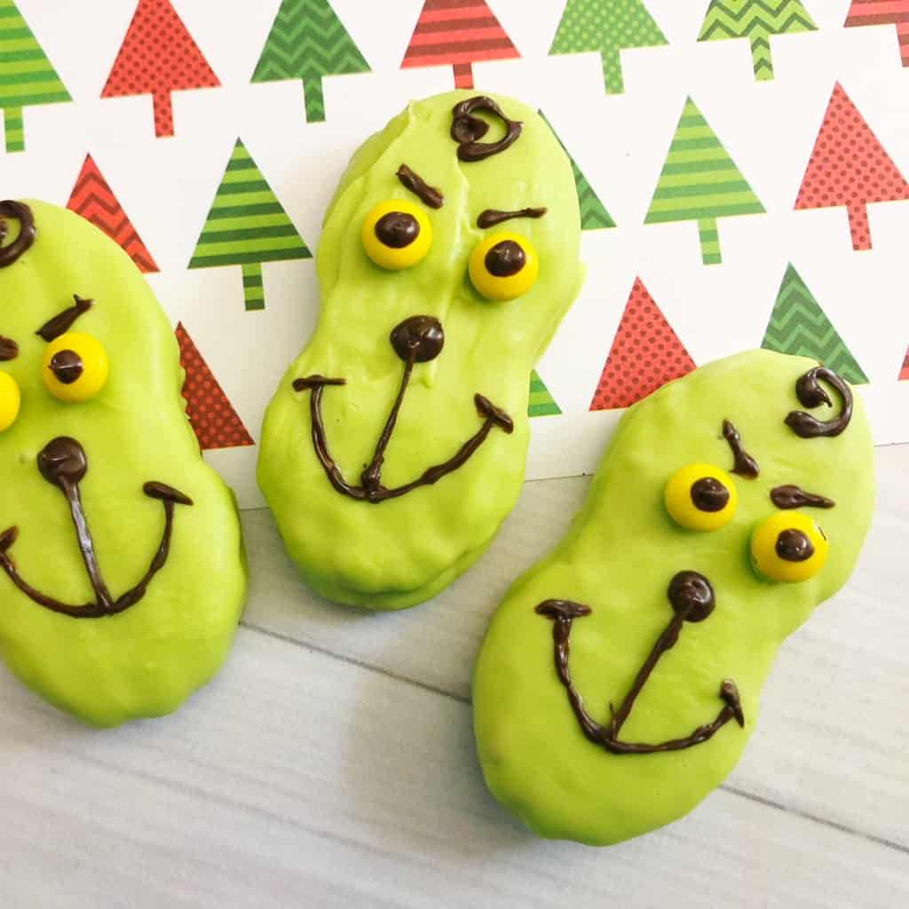 If I could make 10 snacks for my kids' holiday parties at school, the top of the list would be these simple Grinch Nutter Butters. Fast, easy, and so tasty I have to say, I may have eaten more than my share. #nerdymammablog #grinch