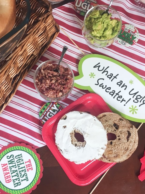 #ad I love a great, traditional party. But you know what I really love? A party that's fun and silly and has it's own pazzazz. This is How to Host an Ugly Christmas Sweater Party and a DIY Hack Your Bagel Bar--because that's a real party. #nerdymammablog #christmasparty