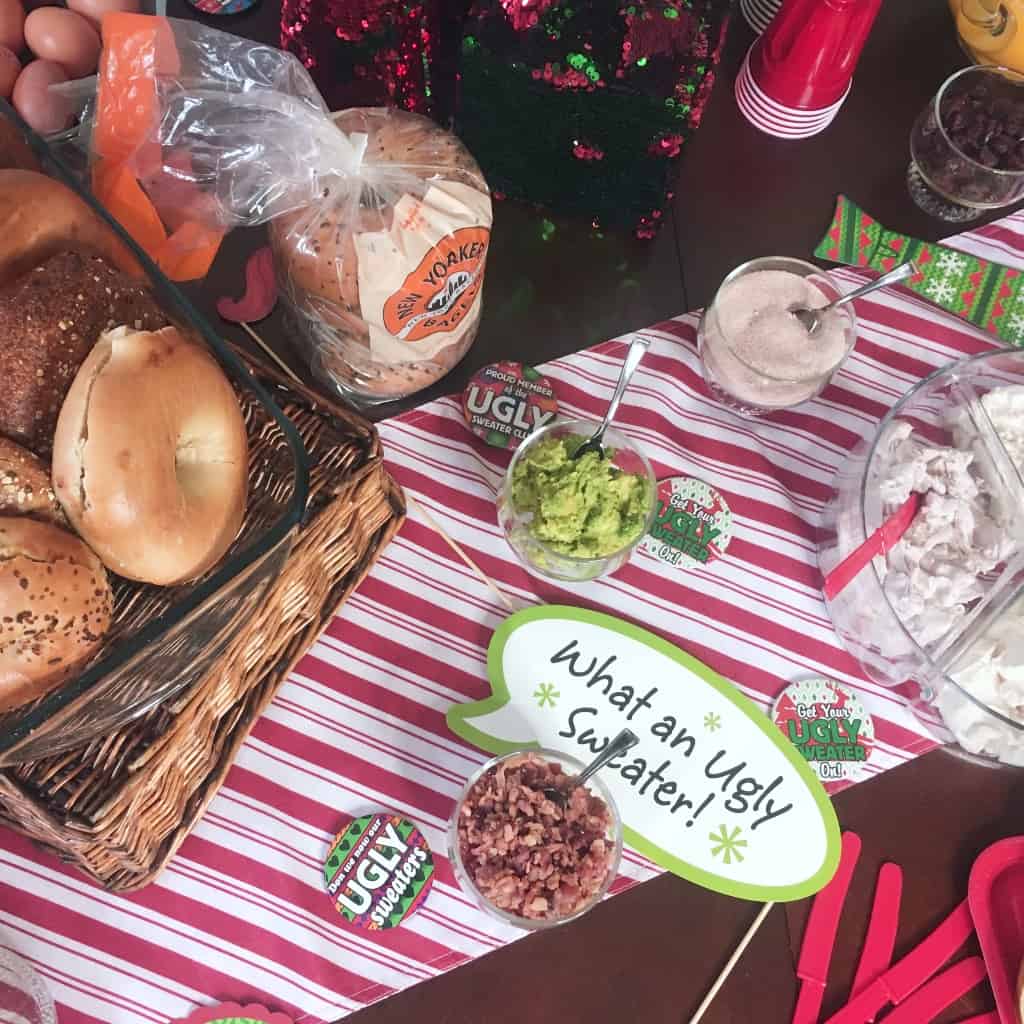 #ad I love a great, traditional party. But you know what I really love? A party that's fun and silly and has it's own pazzazz. This is How to Host an Ugly Christmas Sweater Party and a DIY Hack Your Bagel Bar--because that's a real party. #nerdymammablog #christmasparty