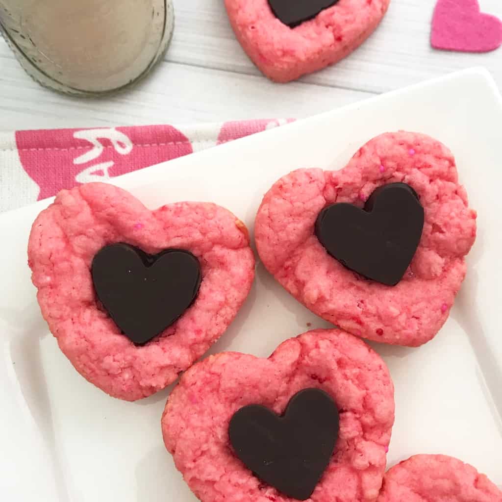 You can't have a kid's Valentines party without some hearts or treats...it's a law. Thankfully these Valentine Cake Mix Cookies fit the bill. #nerdymammablog #valentine #cookies