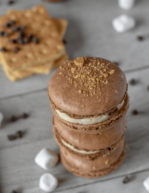 I may have hit upon the world's most tasty dessert. S'mores Macarons are the most s'more-riffic thing I think I've ever tasted. #nerdymammablog #macaron #frenchmacaron #cookie #smores #s'mores #smoresmacarons