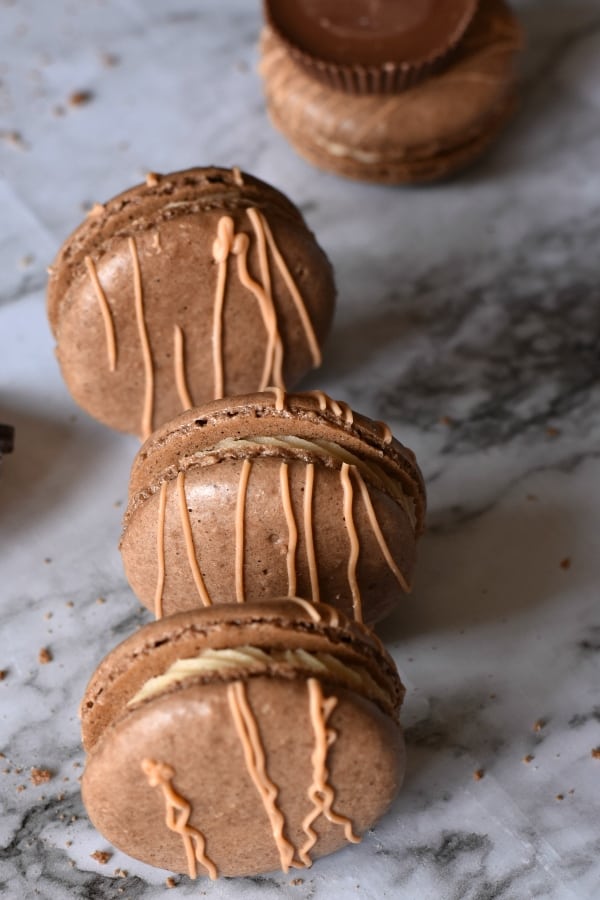 I'm nothing if not honest. And, if I was honest, I would admit that I have an addiction to a certain peanut butter cup. And these Reeces Macarons feed that addiction so well, it's not funny. #nerdymammablog #macaron #frenchmacaron #macaroncookie #cookies #macaronrecipe