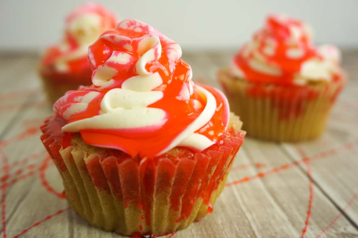 Despite the fact that's its summer, I'm making Bloody Cupcakes because I just really miss Halloween. Using fake edible blood, a yummy cupcake and a spoon, I think I succeeded nicely! #nerdymammablog #halloweencupcakes #bloodycupcakes #halloweencupcakerecipe