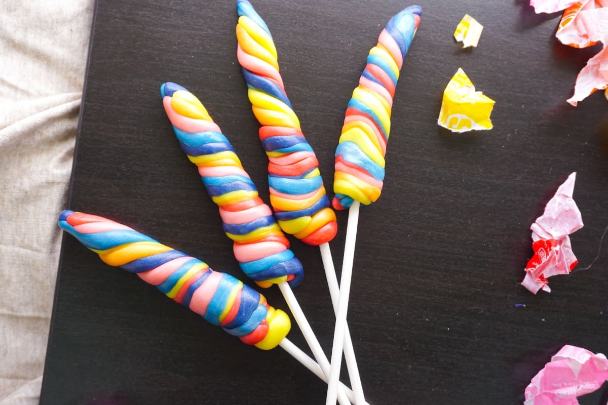 My kids wanted to help me make some "candy" the other day. So, we figured out How to Make Easy Candy Unicorn Horns. Simple, fun and so silly--the kids really loved them! #nerdymammablog #unicorn #unicornhorn #candy #candyunicornhorn