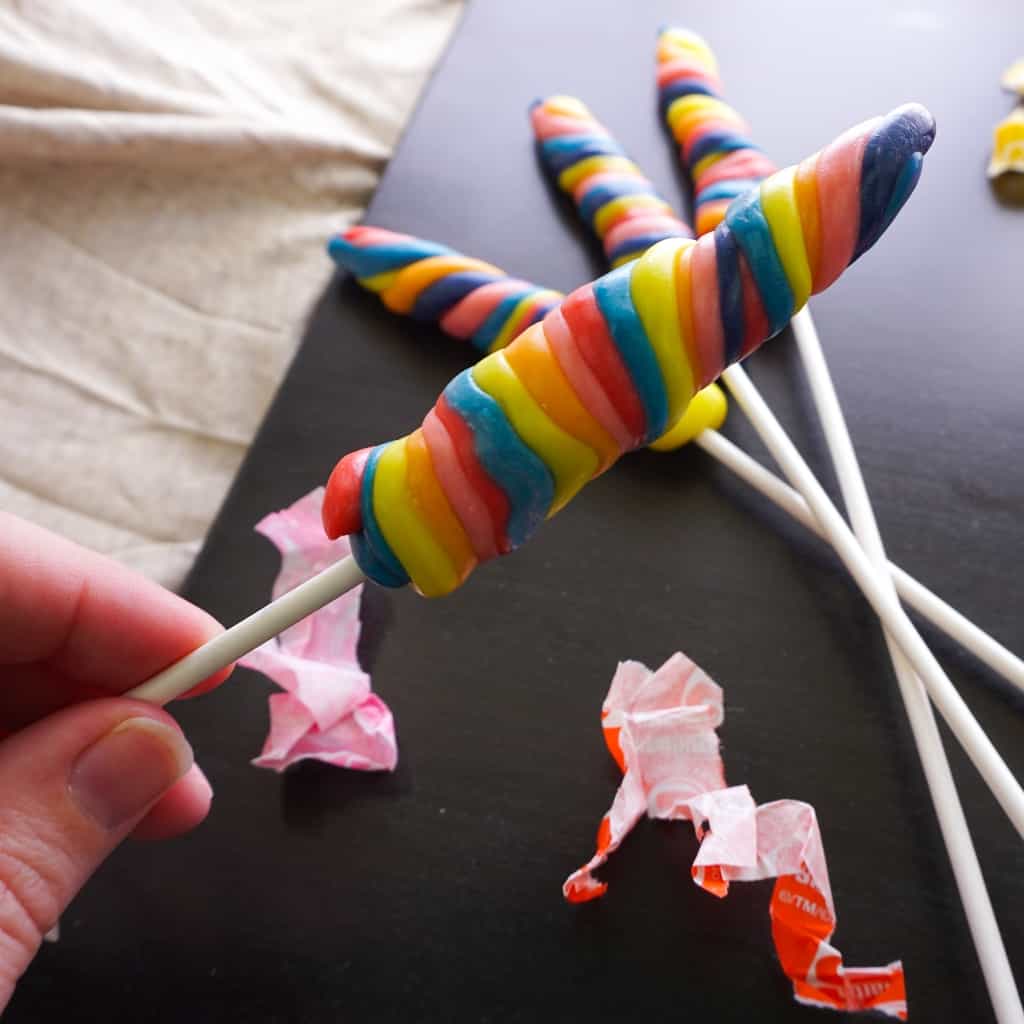 My kids wanted to help me make some "candy" the other day. So, we figured out How to Make Easy Candy Unicorn Horns. Simple, fun and so silly--the kids really loved them! #nerdymammablog #unicorn #unicornhorn #candy #candyunicornhorn