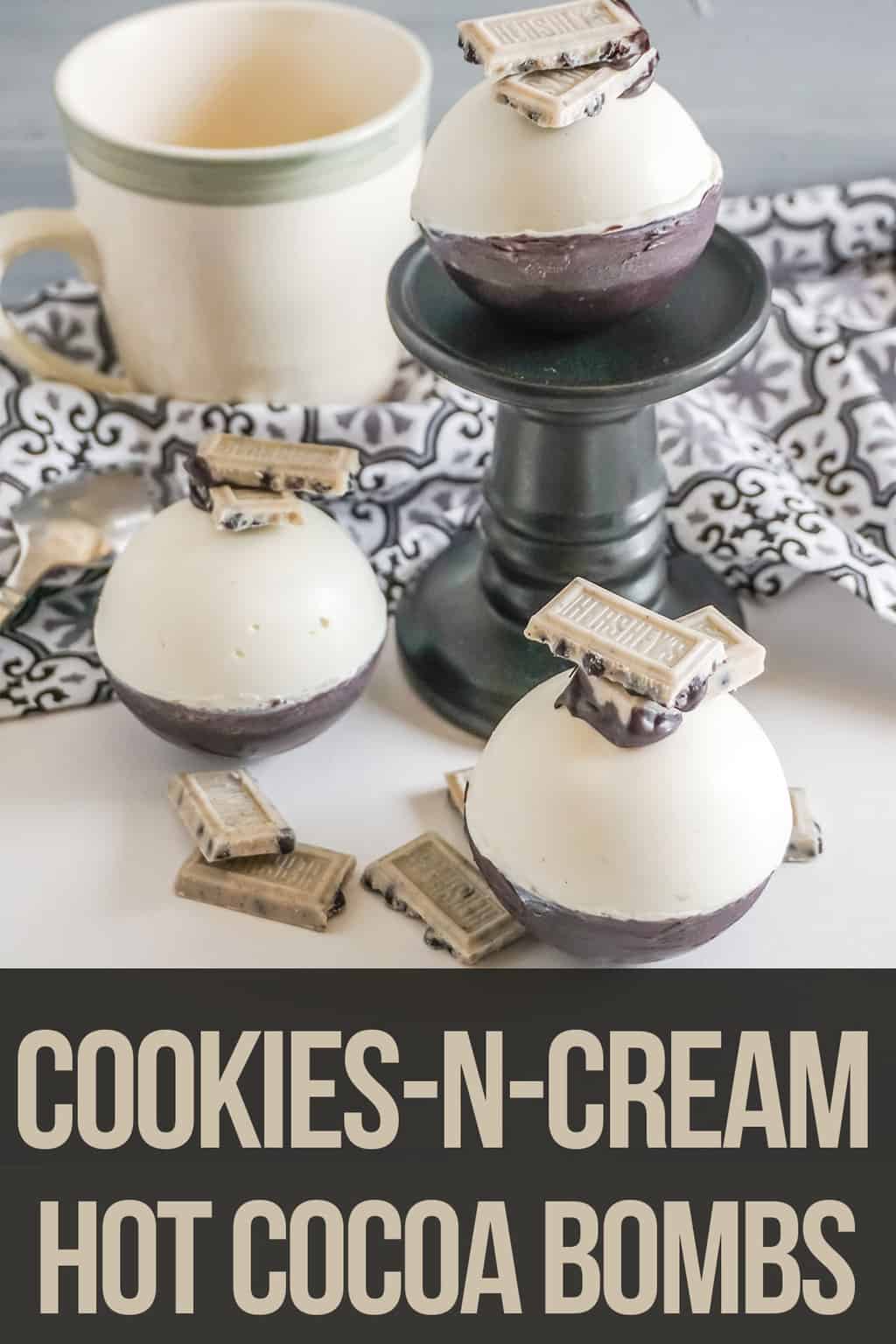 easy black and white hot cocoa bomb recipe with text which reads Cookies-n-Cream Hot Cocoa Bombs