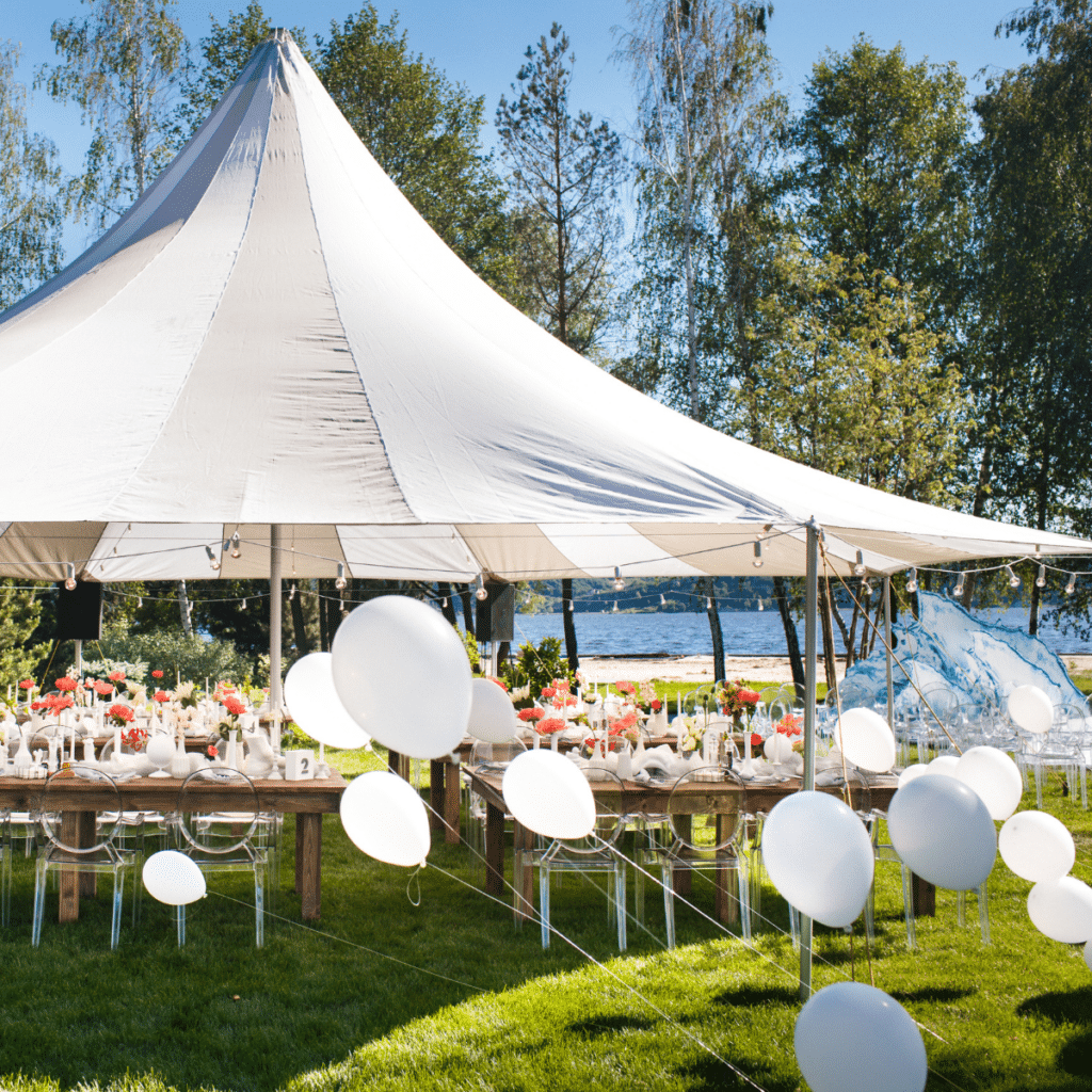 Wedding tent with large balls. Tables sets for wedding or another catered event dinner