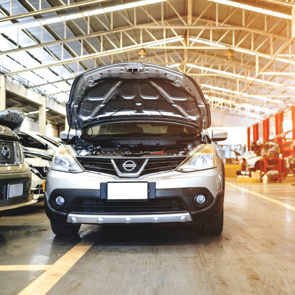 Nissan car in automobile repair service center with soft-focus