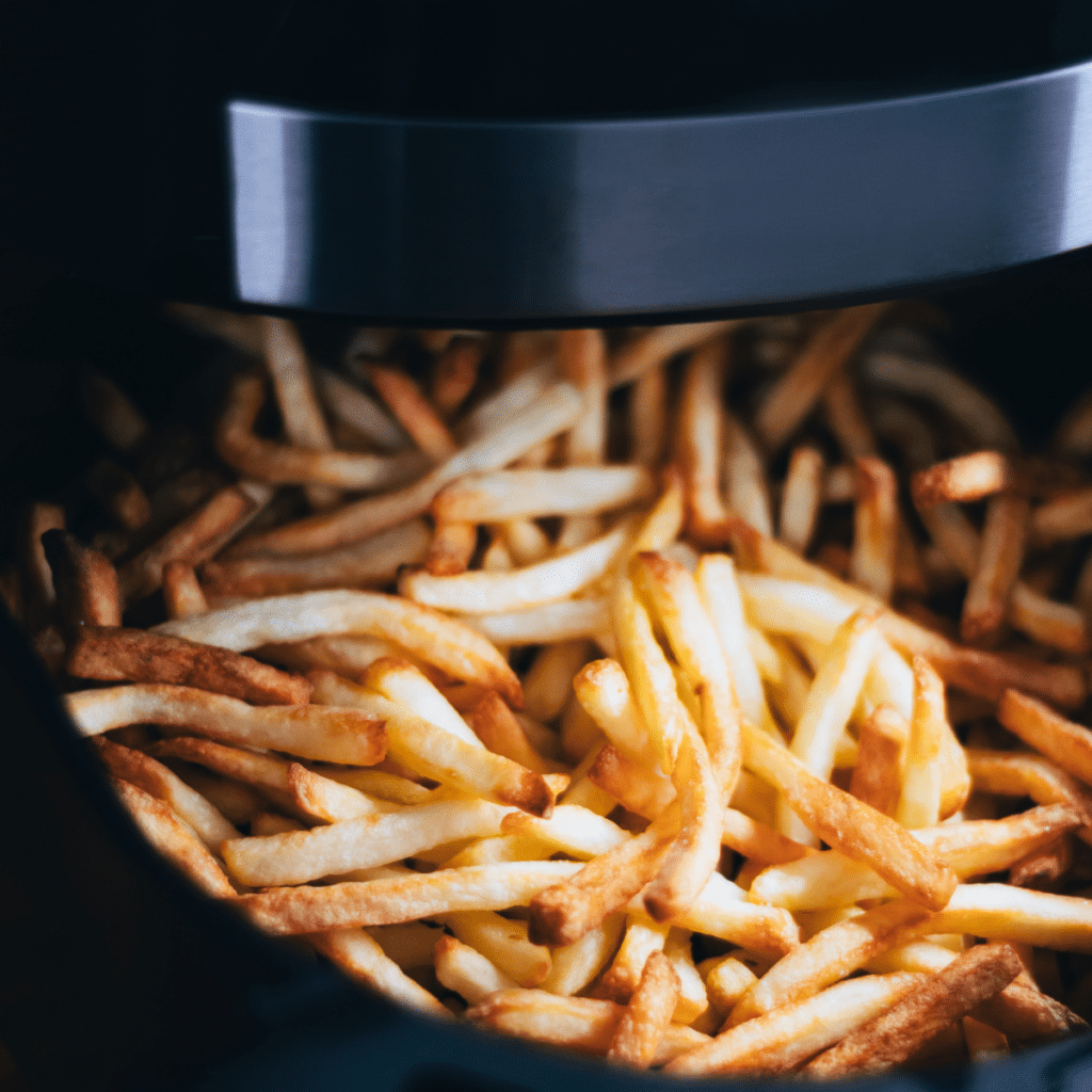 Chips or fries made in trendy kitchen gadget air fryer, small countertop convection oven