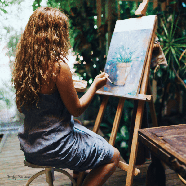 woman sitting painting.