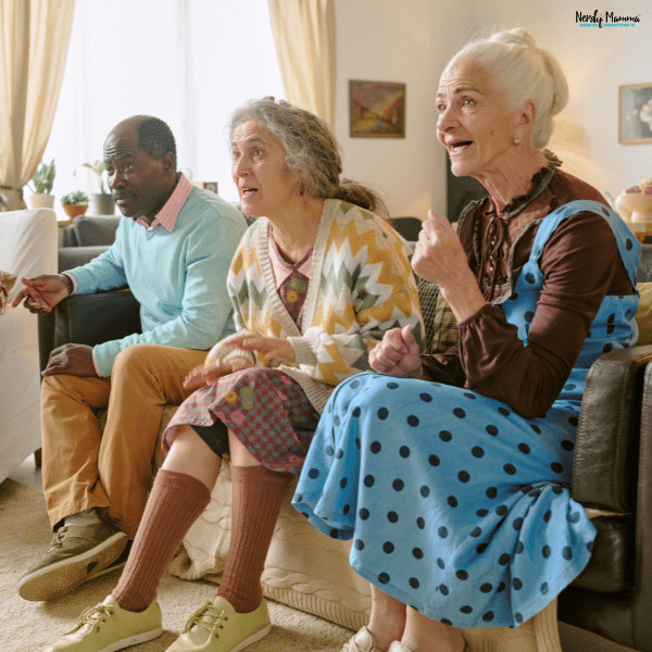 Group of elderly adults sitting together in a living room, representing vulnerable seniors who may need legal protection from neglect or mistreatment.