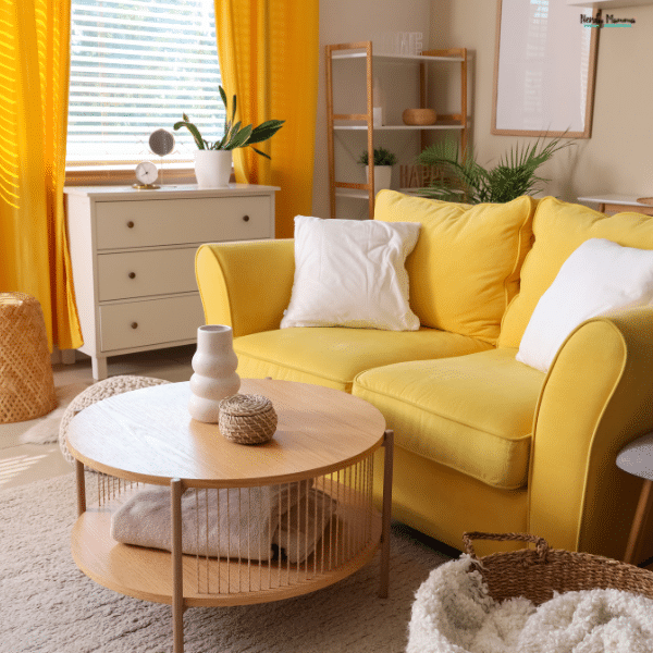 Bright living room with a yellow sofa, light decor, and plants showing easy ways to add spring colors without major changes.