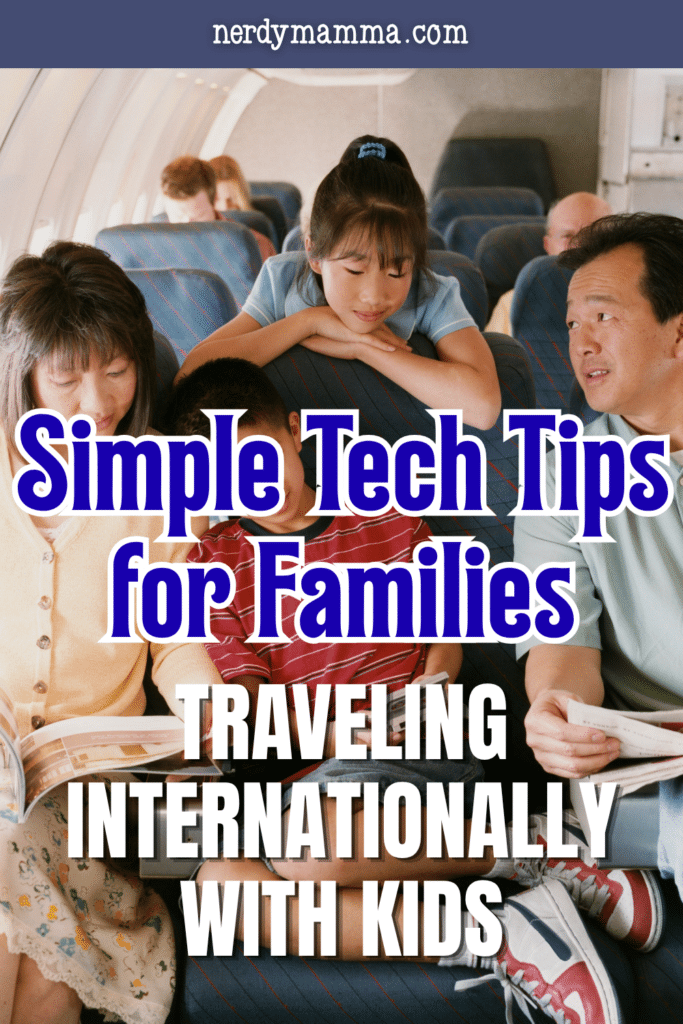 Family using digital devices and entertainment during a long international flight with children for a smoother travel experience.