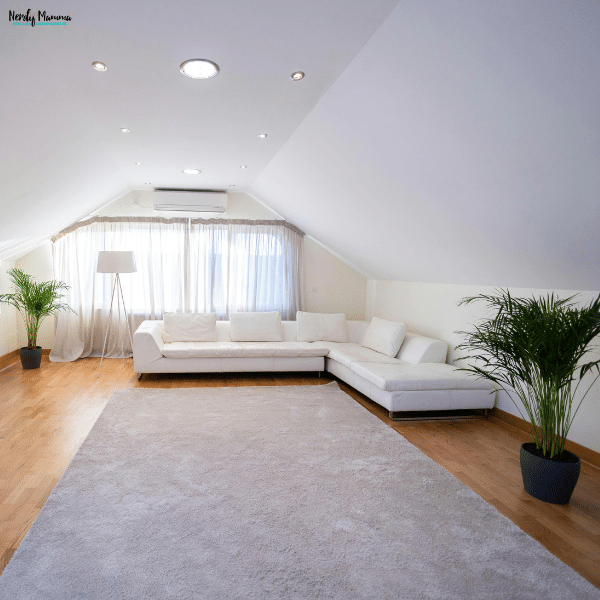 Bright open living room with extra floor space and seating that reflects the appeal of moving to a larger family home.