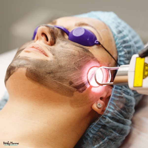 Person receiving an advanced facial treatment with protective eyewear, highlighting professional skincare procedures for skin rejuvenation and complexion improvement.