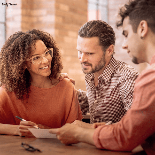 Family meeting with a financial professional to discuss refinancing options and create a plan for improved financial stability.