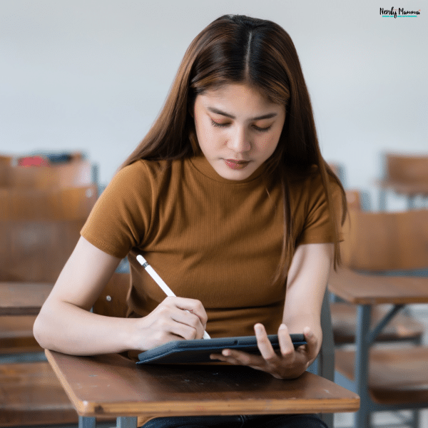Writer using a digital tablet to draft and edit content while focusing on organization, clarity, and productivity.