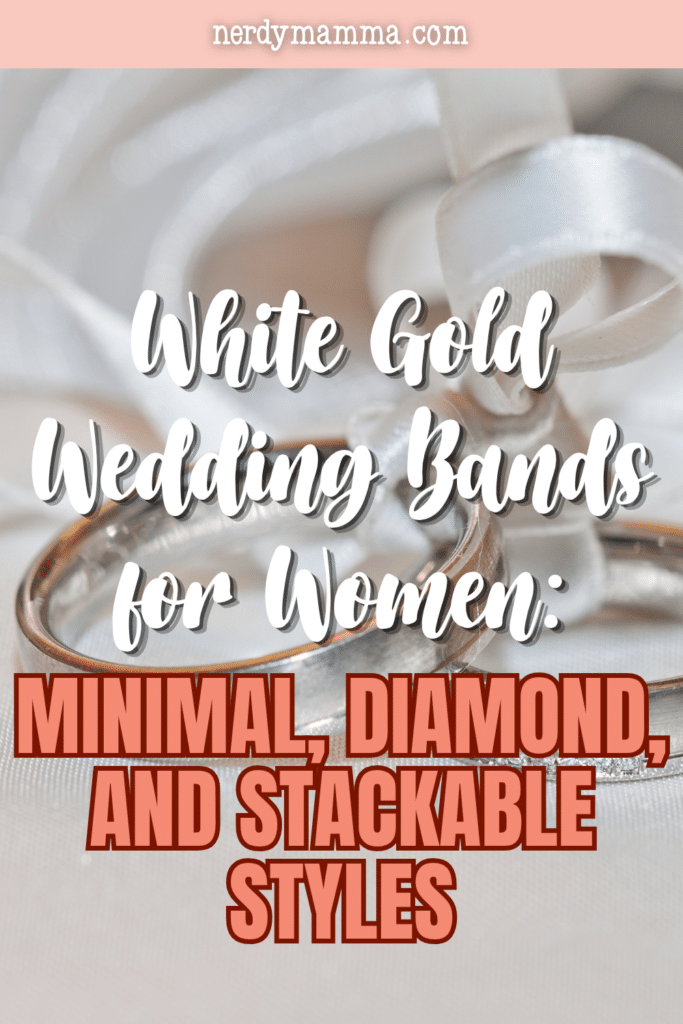 White gold wedding bands paired with satin ribbon, emphasizing classic bridal style and timeless ring design.