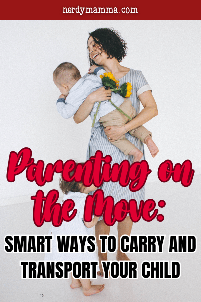 Parent holding a young child while another child stands nearby, representing comfortable and secure ways to carry and transport children throughout the day.