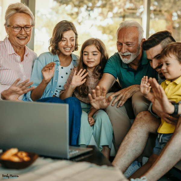 Multigenerational family talking over a laptop, representing relatives in different countries staying connected while coordinating shared finances and financial support.