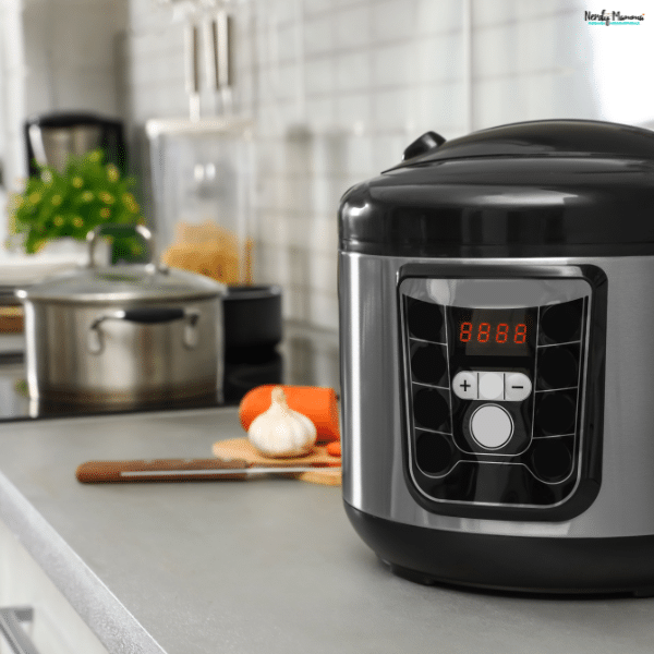 Programmable multicooker on a kitchen counter, highlighting a time-saving kitchen upgrade that simplifies meal preparation for busy families.