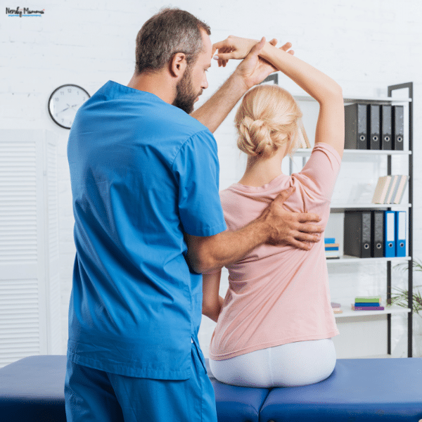 A chiropractor gently evaluates a patient's neck and upper back alignment during an upper cervical chiropractic care appointment.